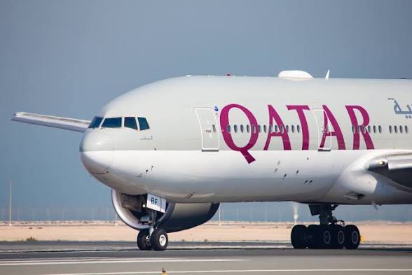 Wide-body airliner taxiing on the runway before a long-haul flight to Africa