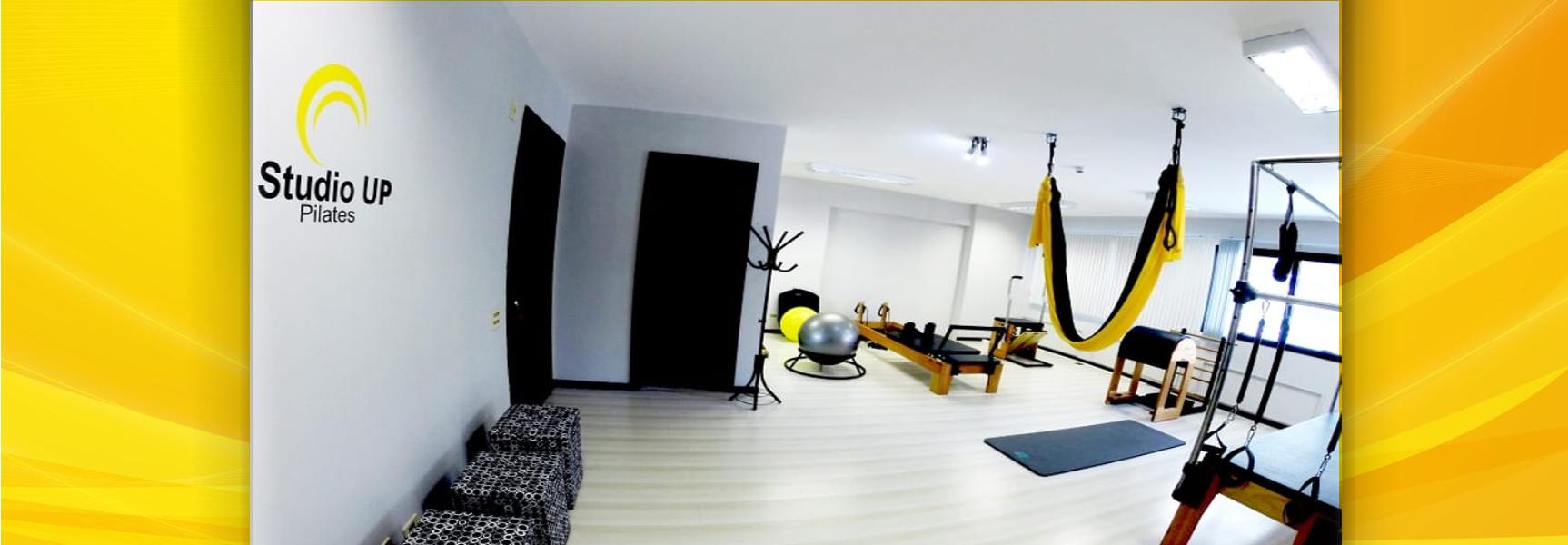 A bright Pilates studio interior with reformer equipment, as offered by Studio Pilates RDC in Kinshasa.
