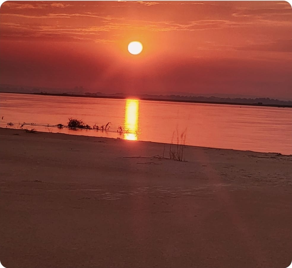 The Congo River at sunset during a DRCTOURISM Social Club river cruise.