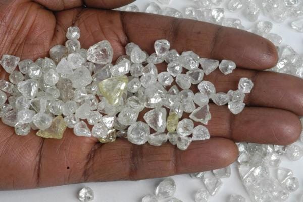 Congolese diamonds in hand