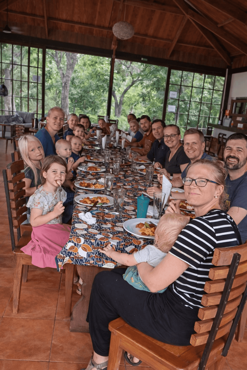 Guests enjoying communal dining at Garamba Lodge restaurant