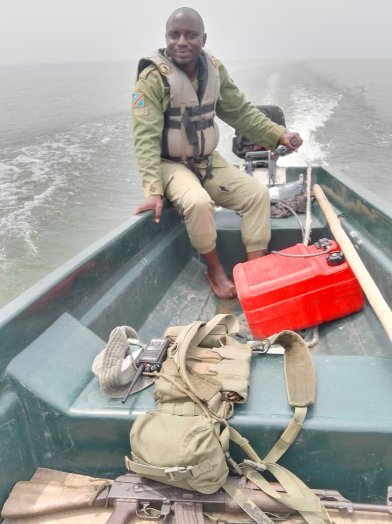 Park ranger on patrol boat