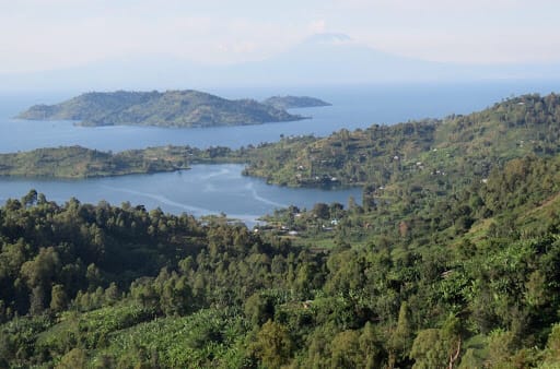 Scenic view of Kavala Island on Lake Kivu with lush green hills