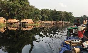 Traditional floating villages on stilts at Lake Mai-Ndombe