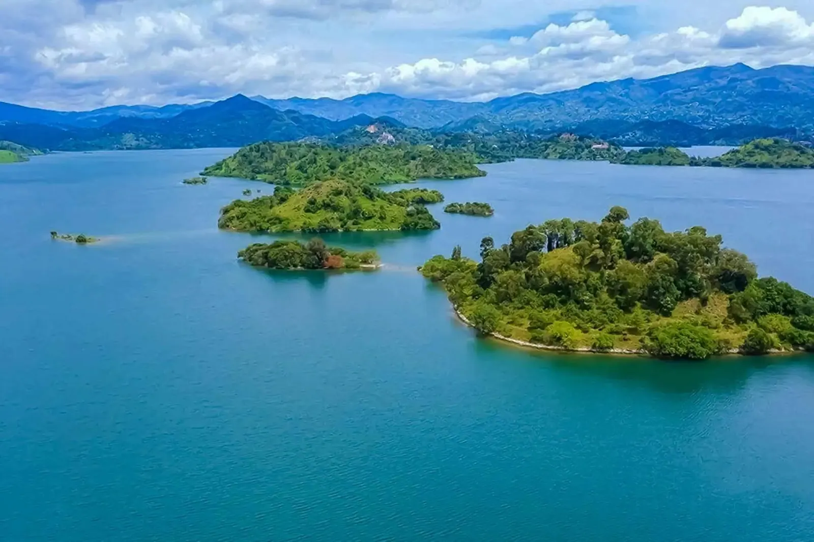 Crater lake panorama from a coffee plantation viewpoint in eastern DRC — 5-day Lakes & Coffee experience
