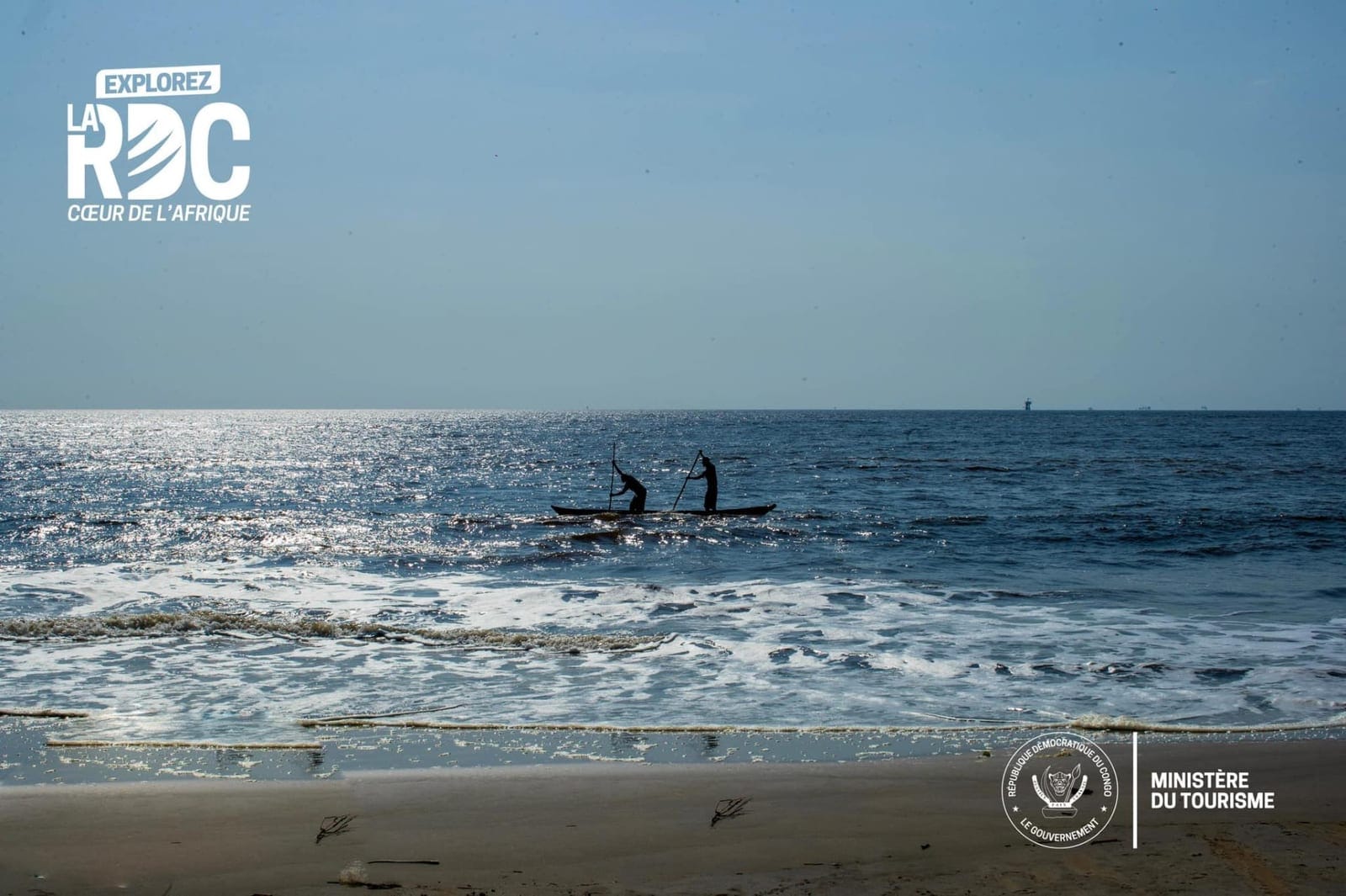 Plage Tonde beach with fishermen on the Atlantic Ocean in Moanda
