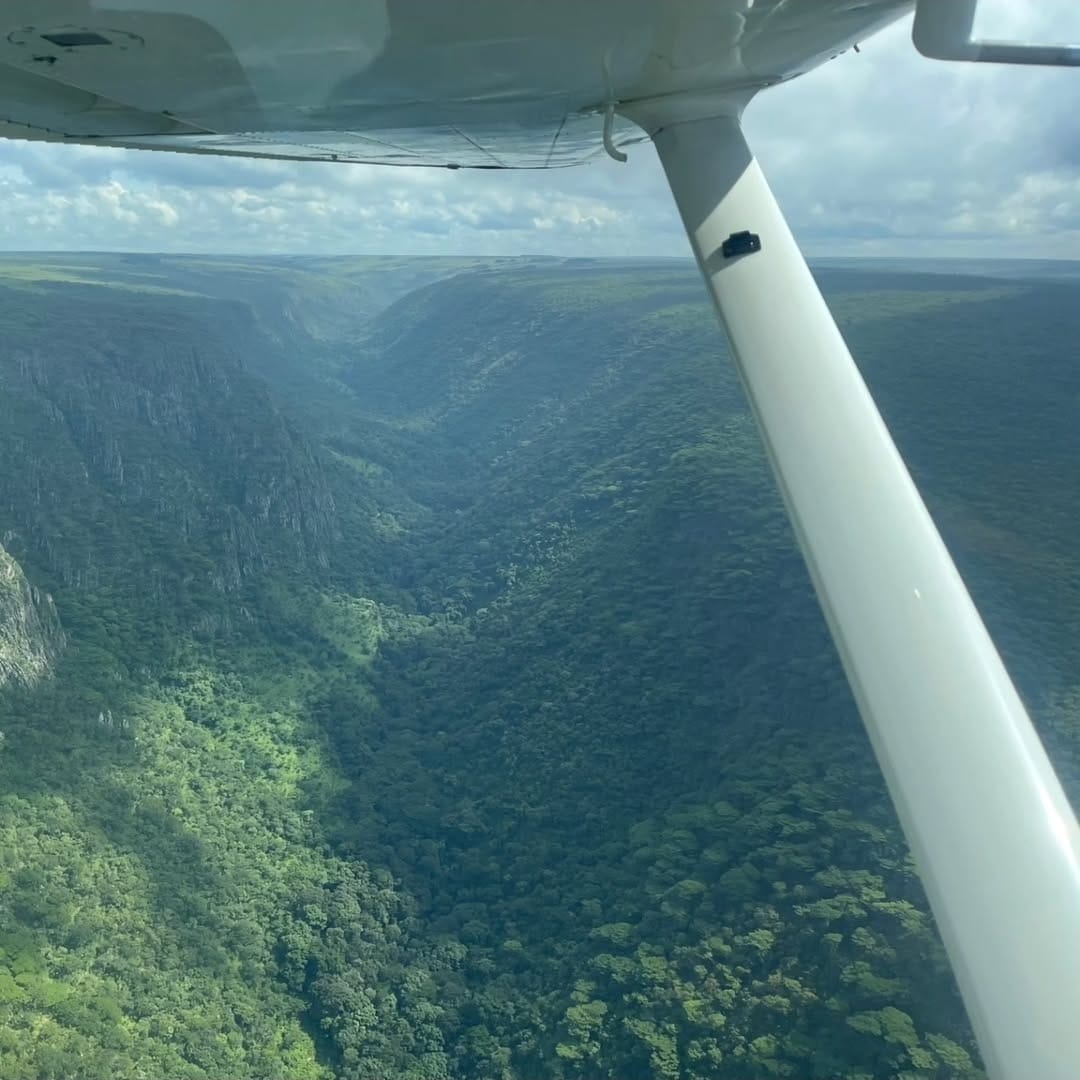 Bush plane flying over Upemba gorges